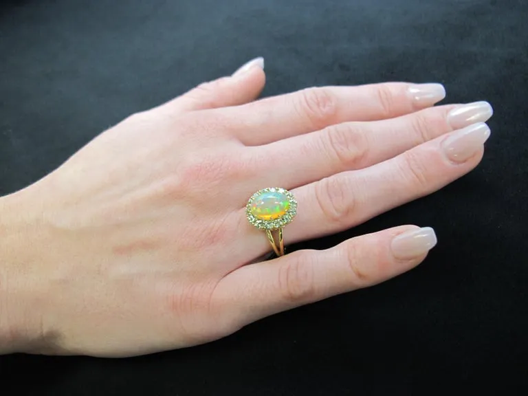 2.40 Carat Opal, Tsavorite Garnet Halo Yellow Gold Cluster Cocktail Ring