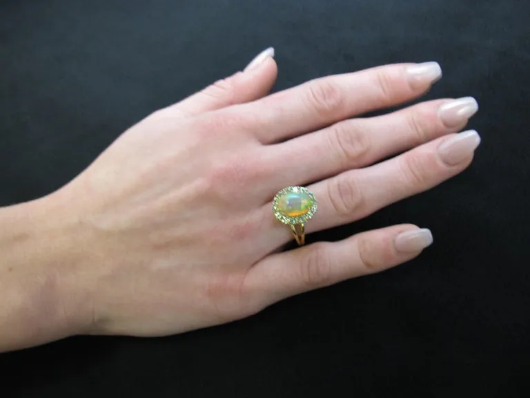 2.40 Carat Opal, Tsavorite Garnet Halo Yellow Gold Cluster Cocktail Ring