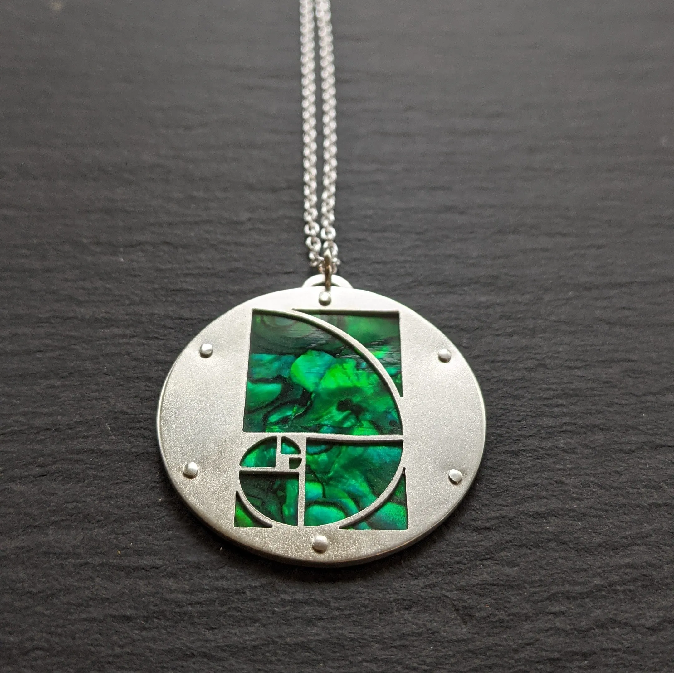 Handcut Golden Spiral Pendant - round